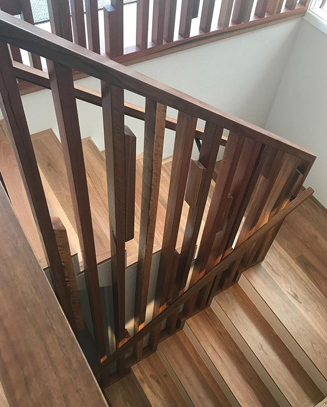 The Stairs Are Made Of Wood And Have A Wooden Railing — Hardwood Projects in Canberra, ACT