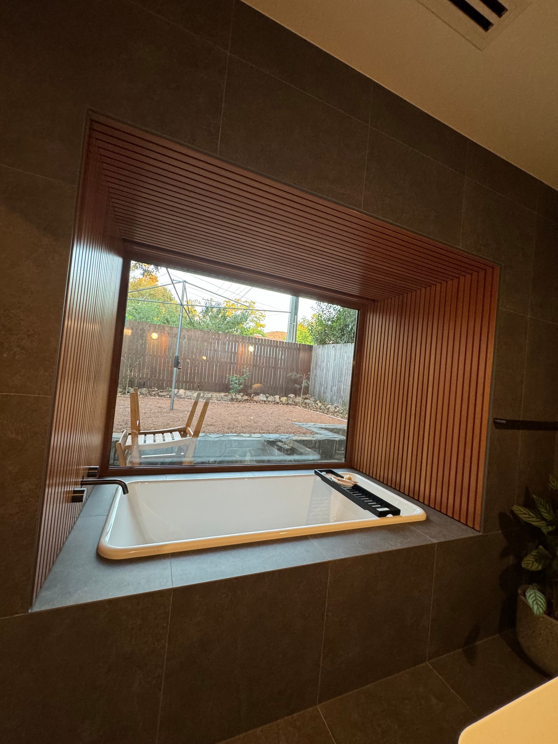 A Bathroom With Two Sinks And Two Mirrors And Cabinets — Hardwood Projects in Canberra, ACT