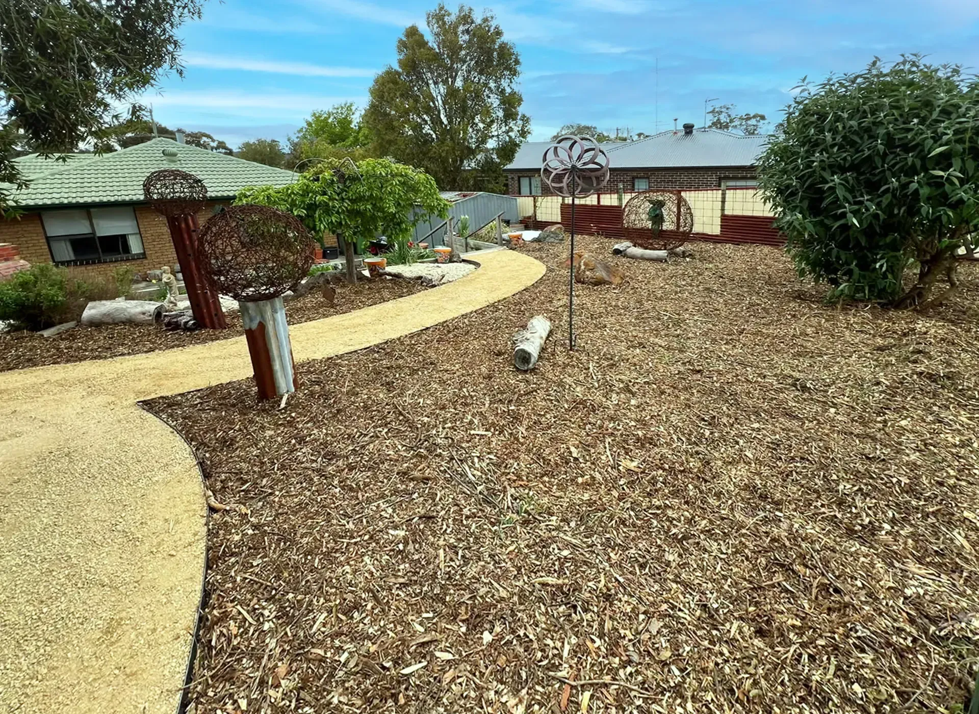 Mt Clear, Ballarat landscaping project featuring gravel paths, steel edging and mulched garden beds.