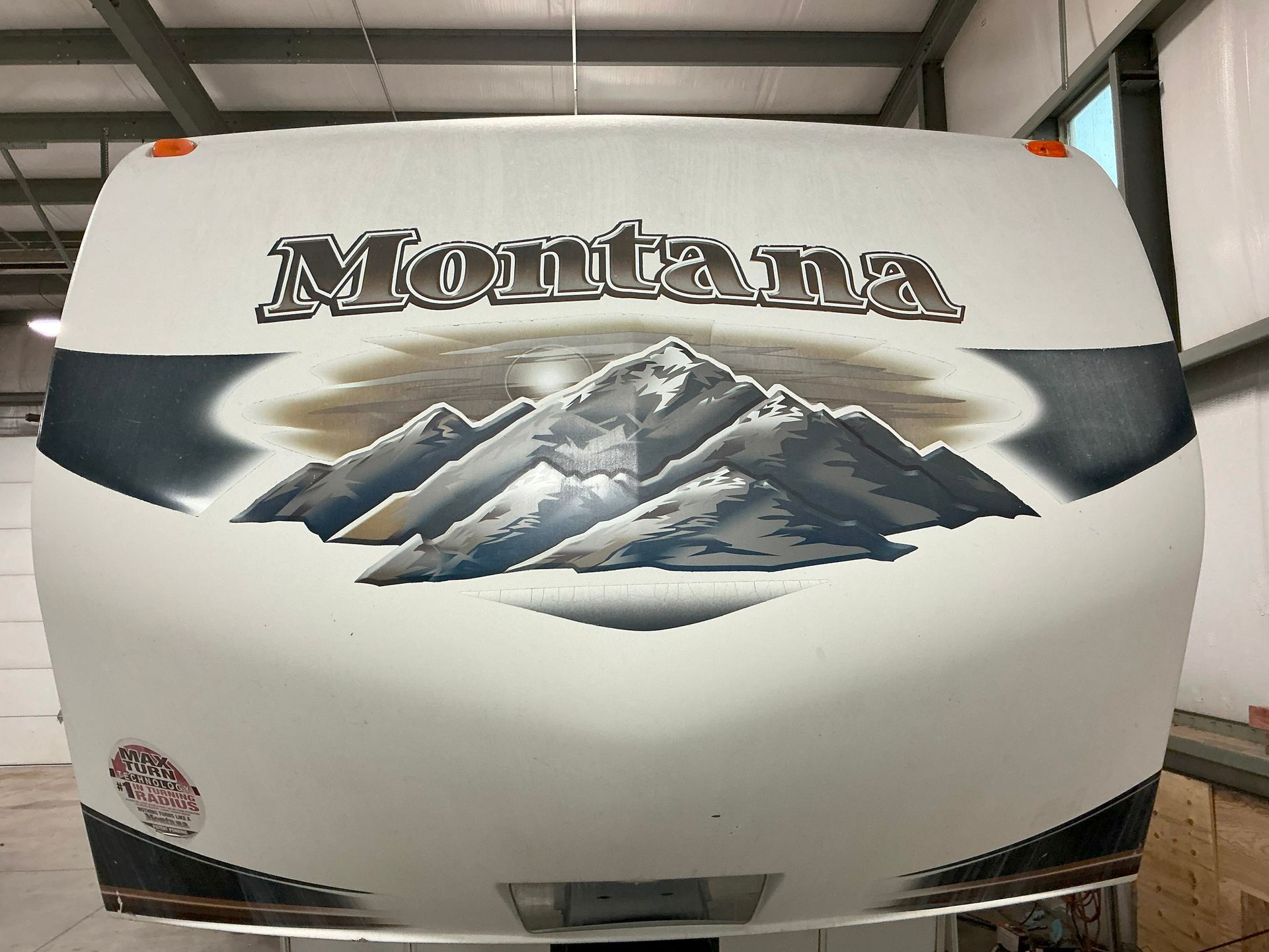 Motorhome awning at night with string lights