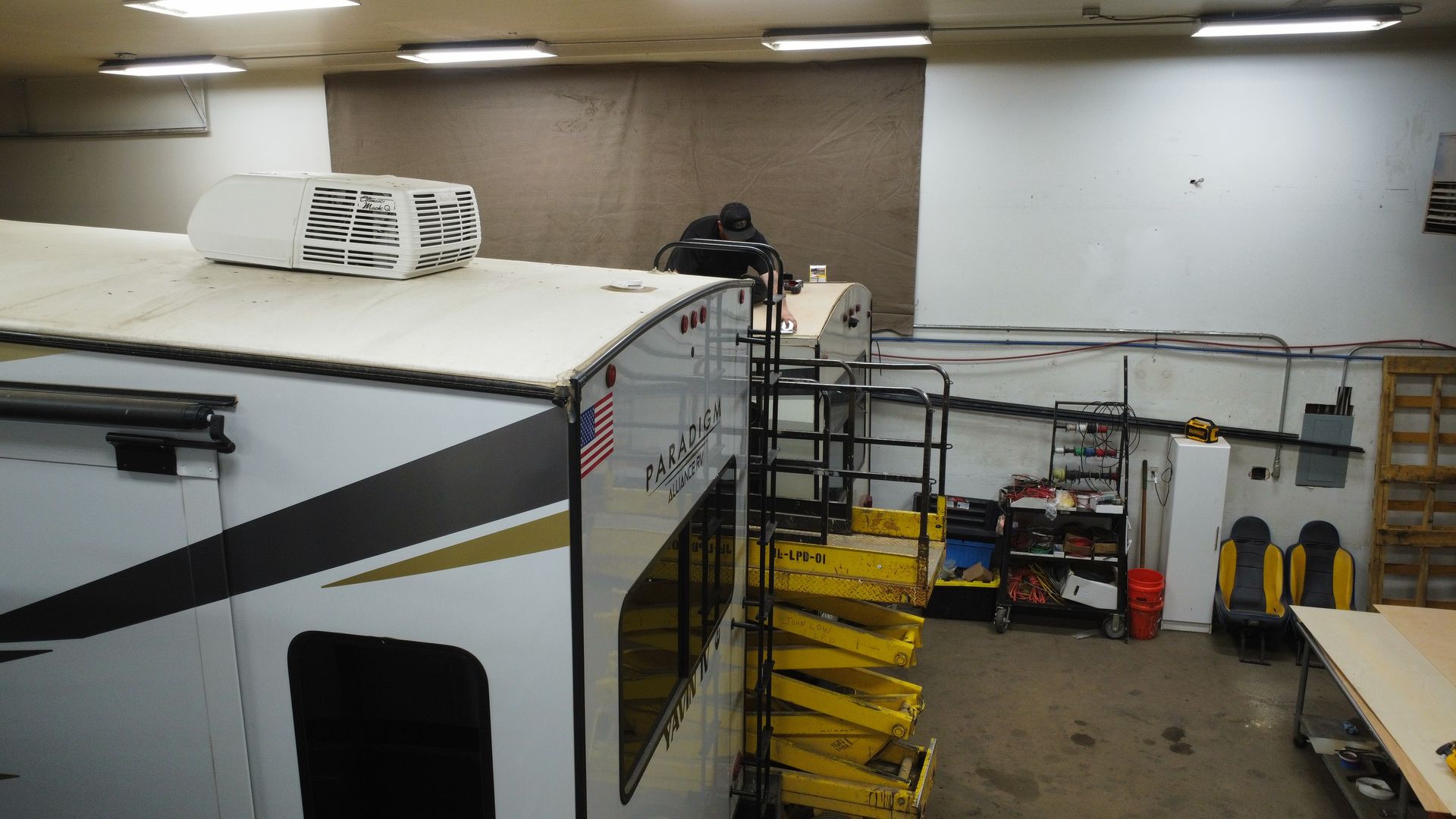 Jefe's RV Service has it's own scissor-lift for easy roof repair access.