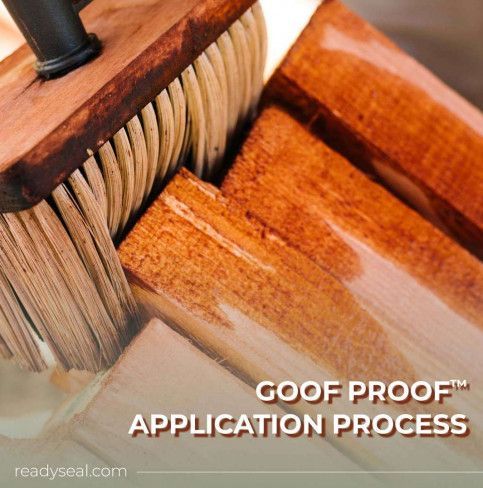 A wooden brush is being used to apply a goof proof application process