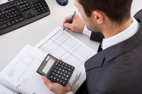 Tax professionals calculating tax