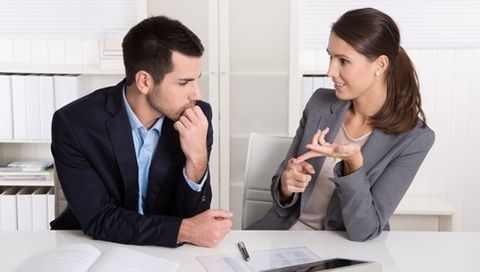 Tax professional discussing about tax with her client