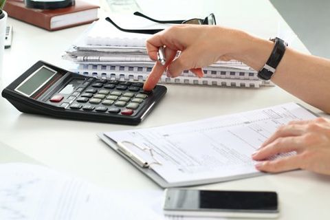 Tax professional calculating tax