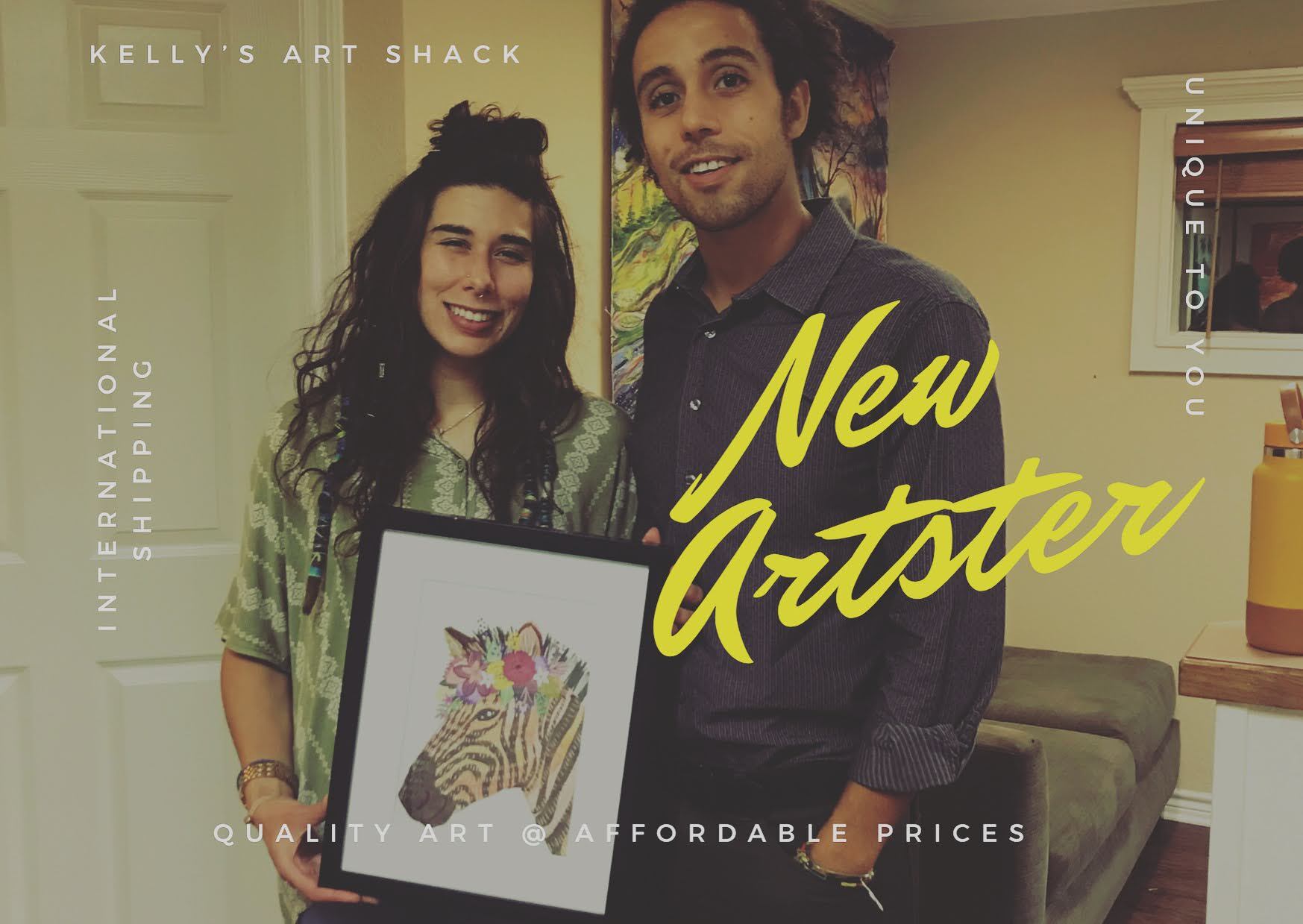 A man and a woman are holding a framed picture of a zebra.