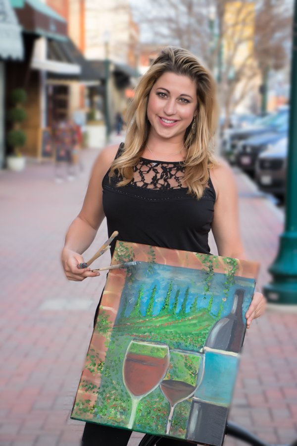 wall muralist Kelly Gottuso in Downtown McKinney