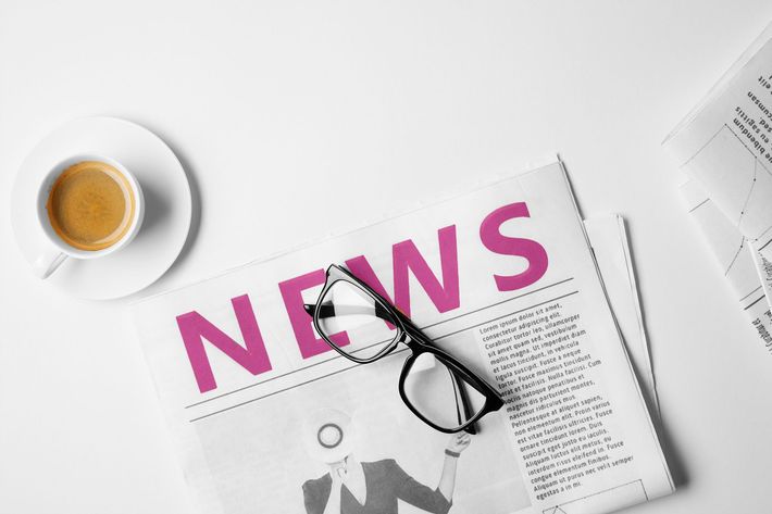 Black and white hands holding house to represent home insurance