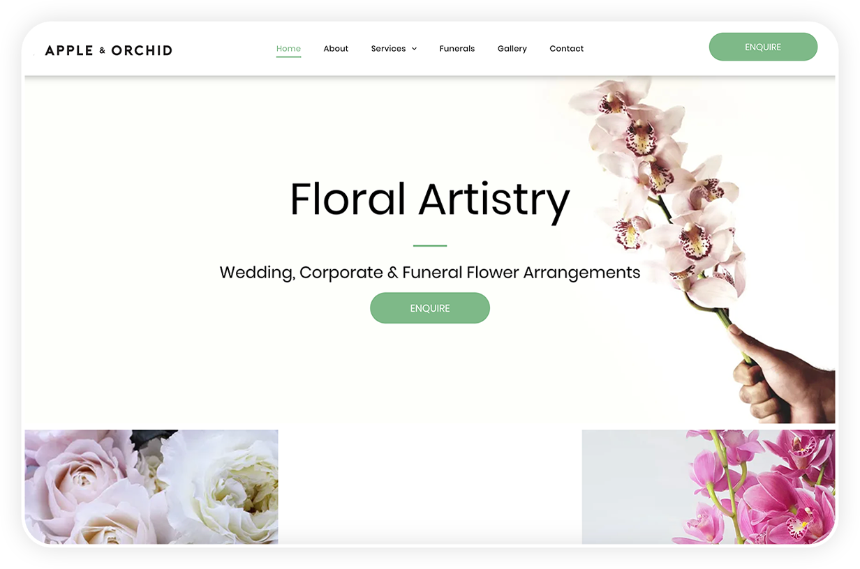 A person is holding a flower in their hand on the floral artistry website.