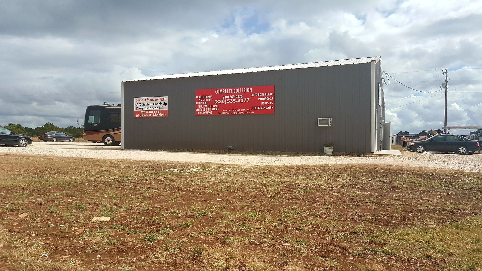 A large building with a red sign on the side of it