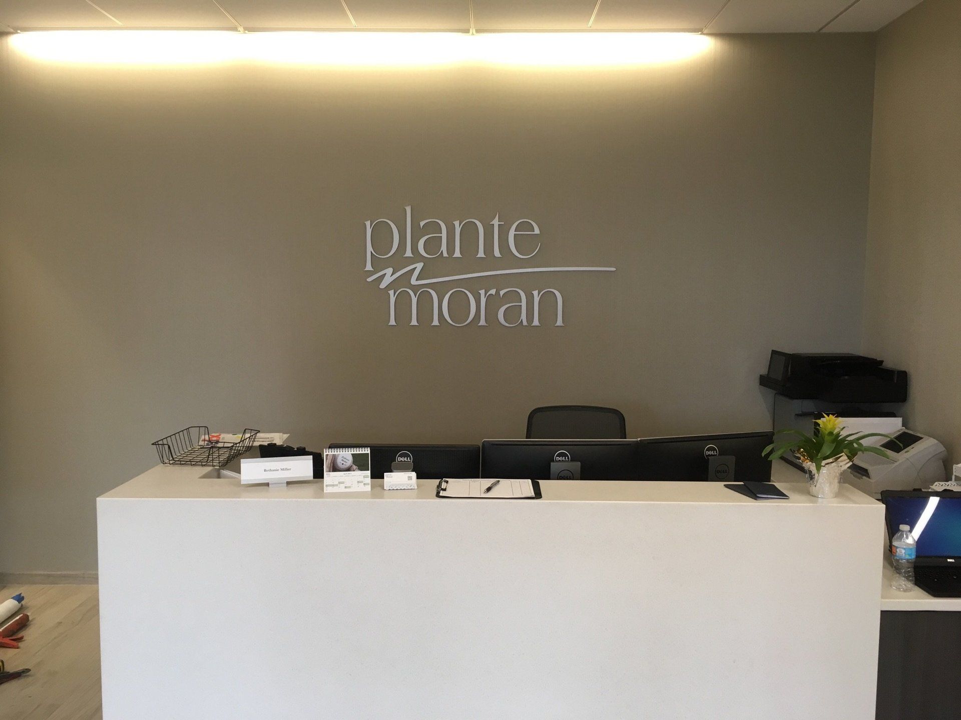 Sign company columbus ohio interior signage cut vinyl reception desk recognition wall