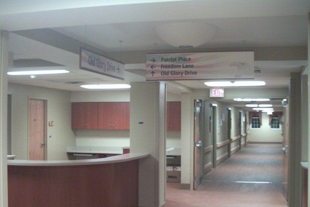 Sign company columbus ohio interior signage cut vinyl reception desk recognition wall