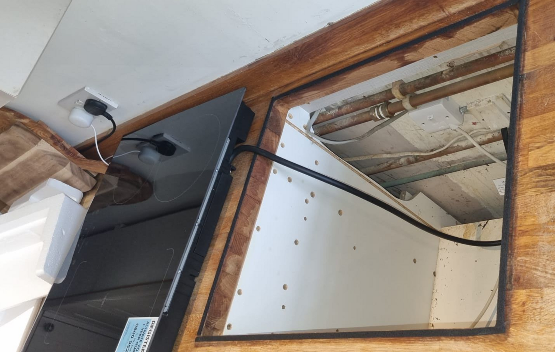 Electric Cooker Connection Setup in Kitchen