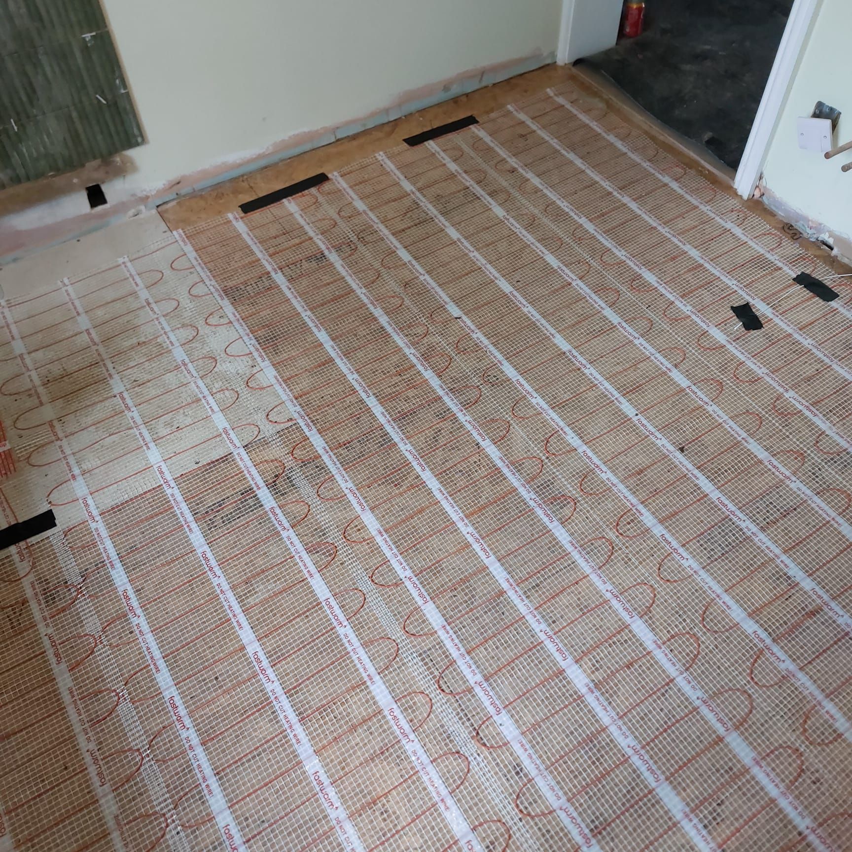 Electric underfloor heating mats installed in Sussex home
