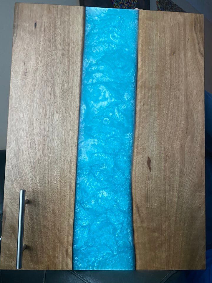 Walnut kitchen door with turquoise inlay