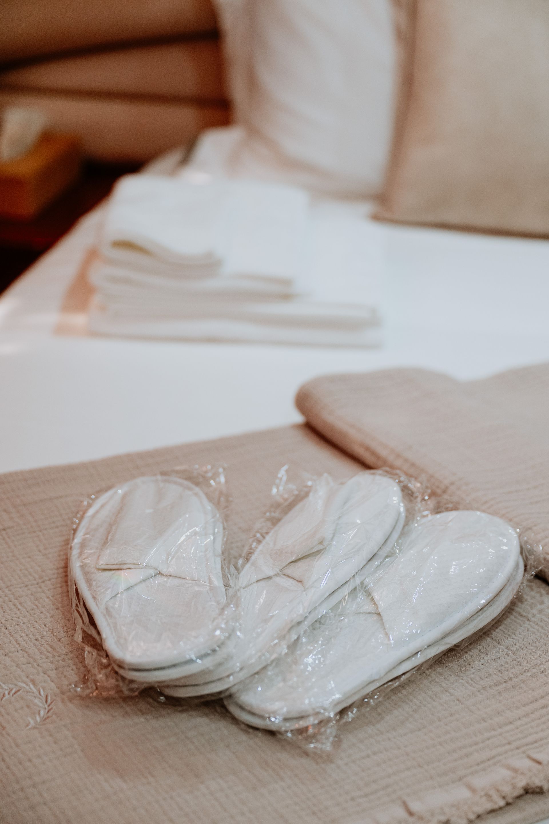 Fresh luxury towels neatly arranged on a yacht bed