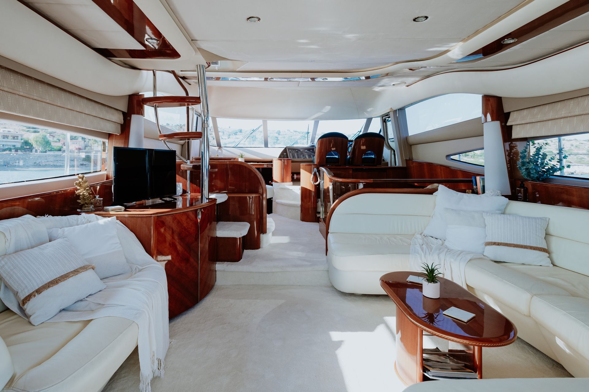 Luxury yacht interior lounge with panoramic ocean views