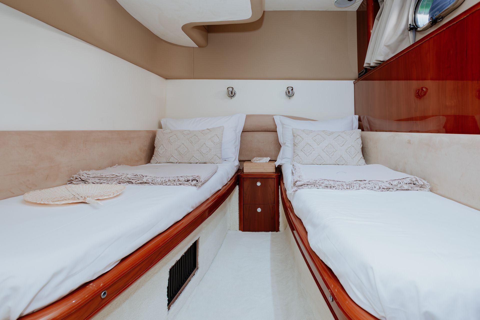 Compact yacht bedroom designed with premium finishes