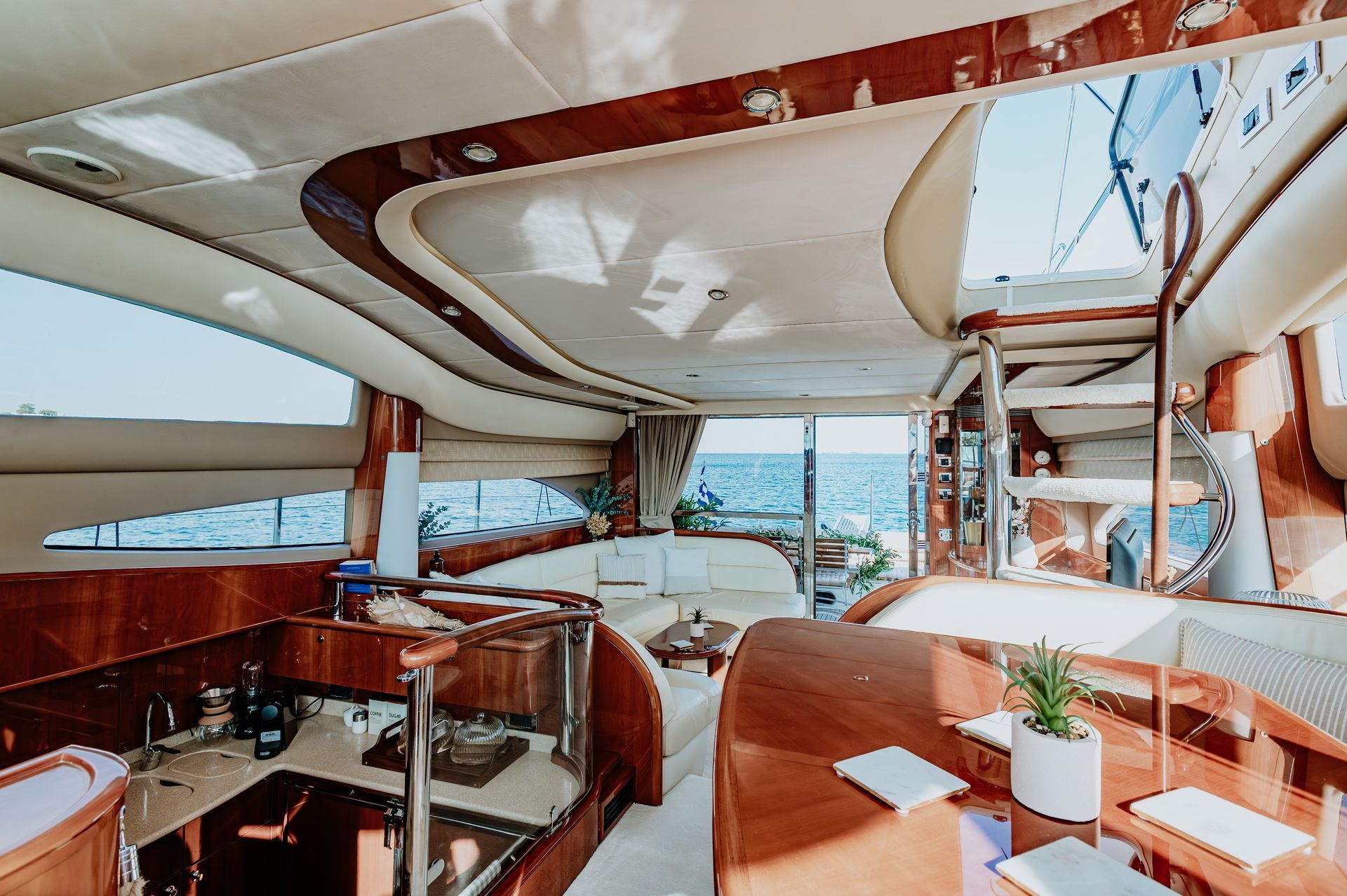 Elegant yacht cabin with modern furnishings and natural light