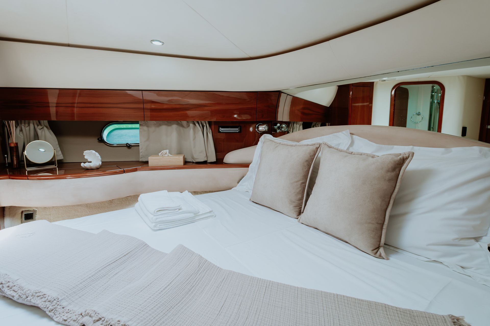 Spacious yacht bedroom suite with sea view windows