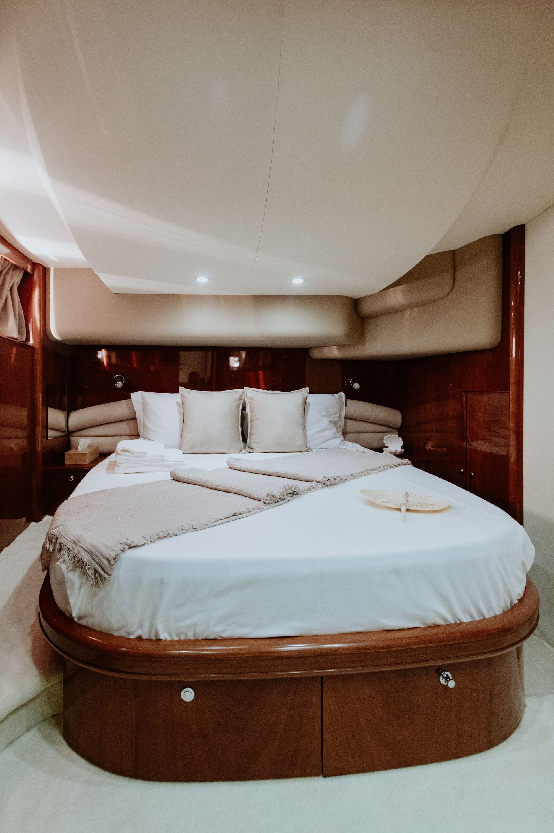 Private yacht bedroom interior with modern amenities