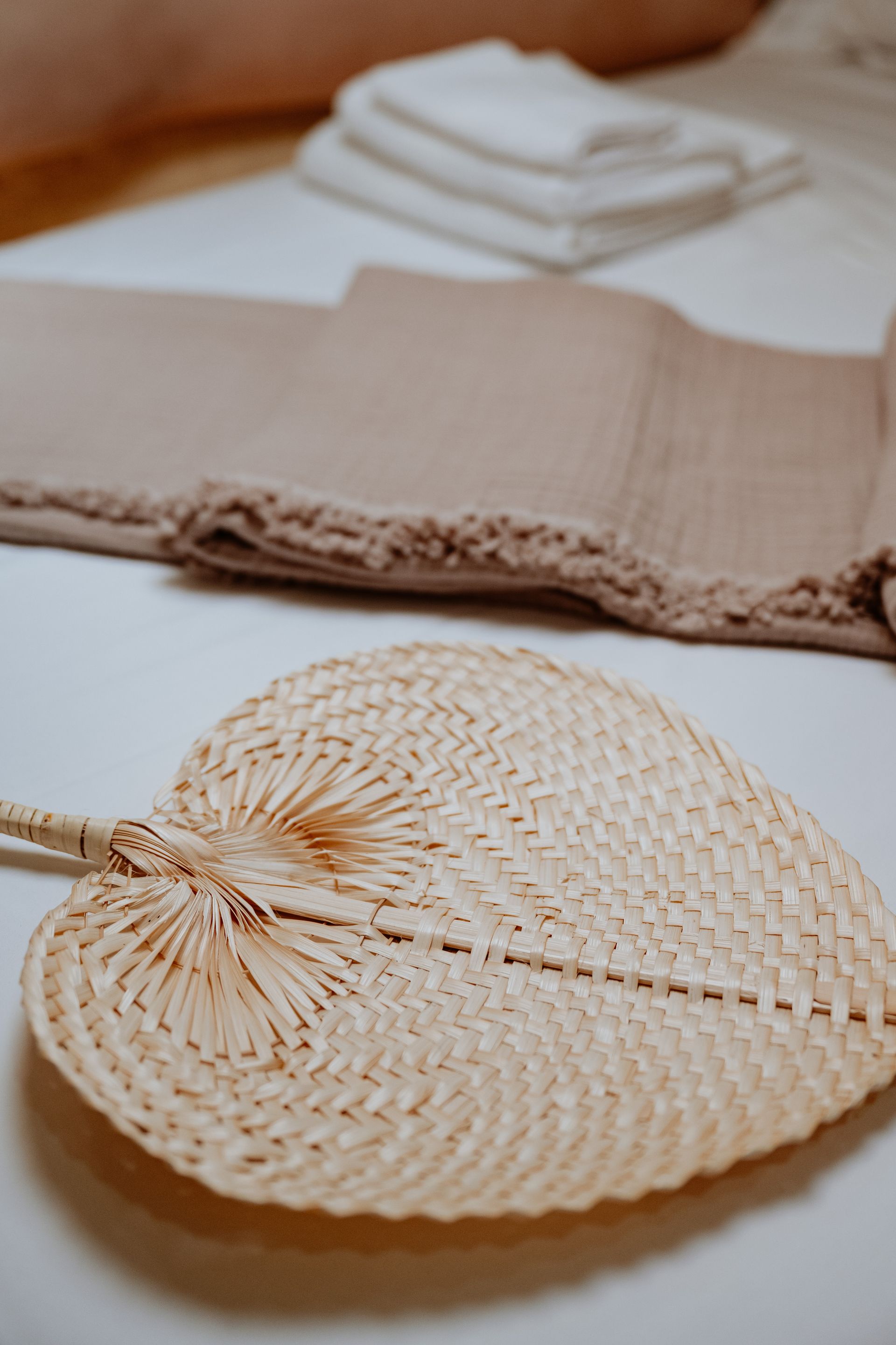 Soft white towels prepared for guests onboard a yacht