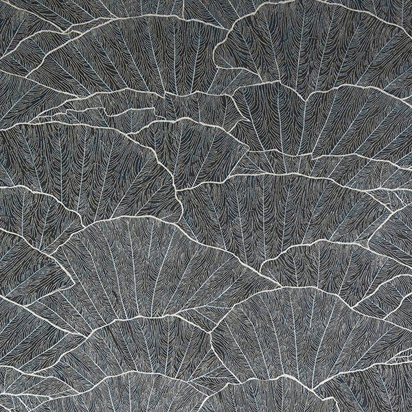 a close up of a fan shaped pattern on a gray surface .