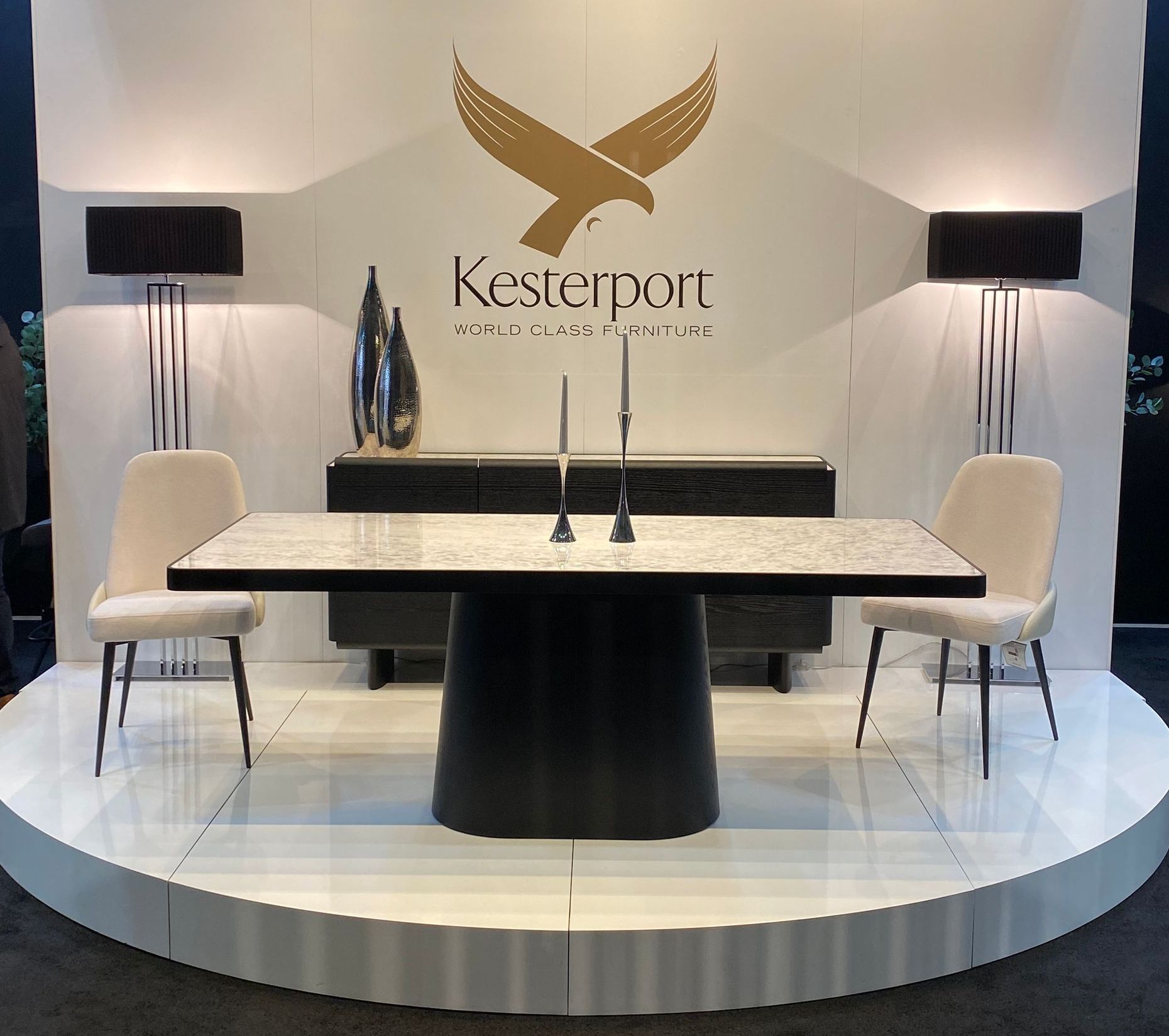 luxurious Kesterport marble table and dining chairs with complementary cabinet and free staning tall lamps at the January Furniture Show 2024, NEC, Birmingham