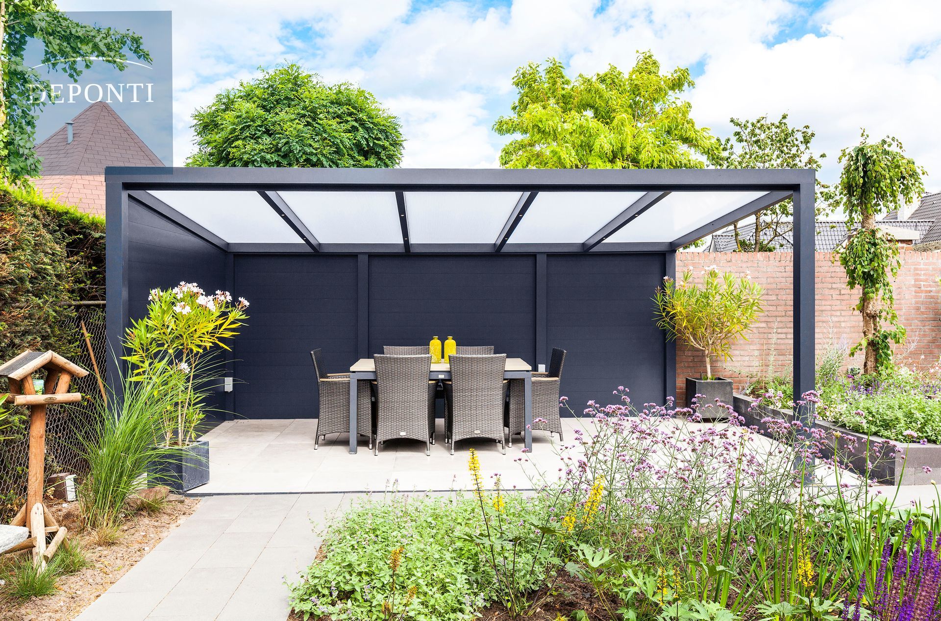 Garden Deponti aluminium veranda with a table and chairs under the canopy