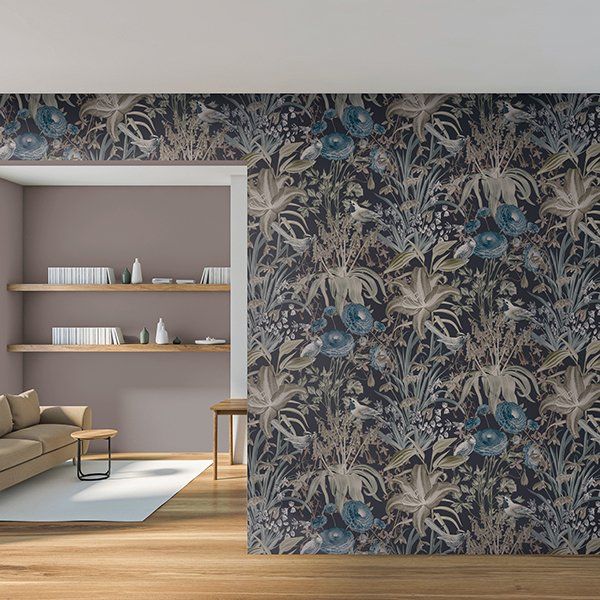 a living room with a floral wallpaper on the wall
