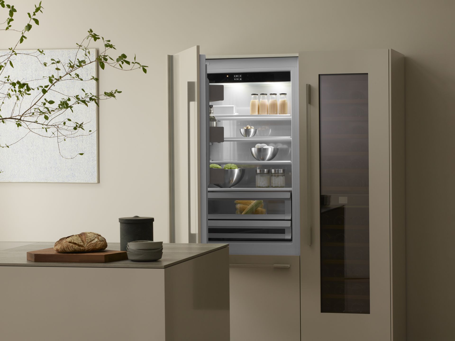 V-ZUG fridge internal shot with vegetables and containers in luxury kitchen