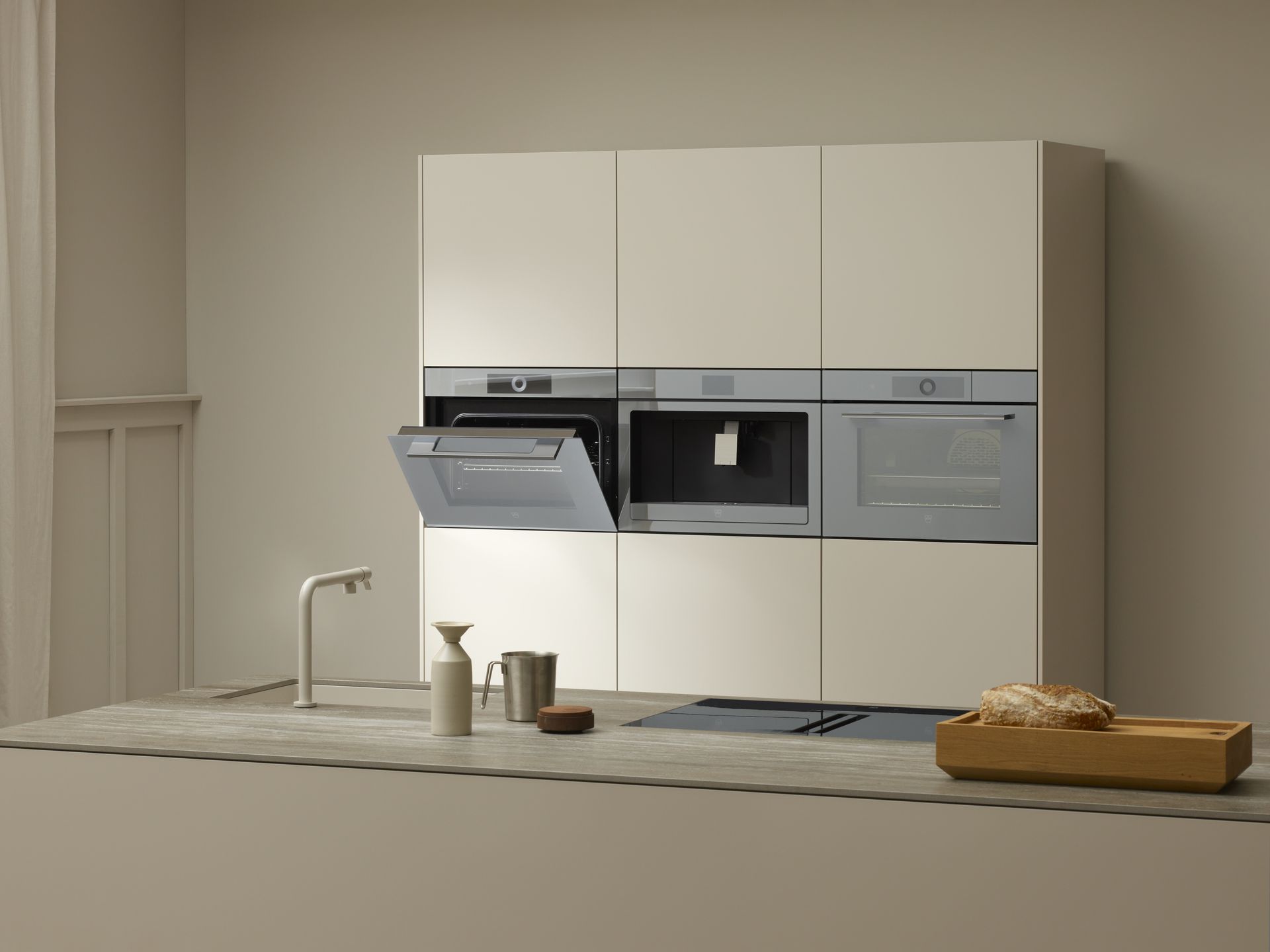 V-ZUG luxury kitchen with oven, coffee center and steamer with open cooker door