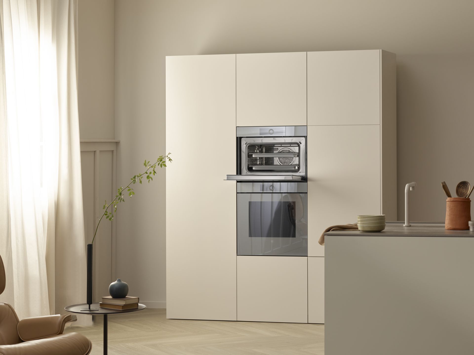 V-ZUG double cooker and microwave unit in luxury kitchen with oven door open