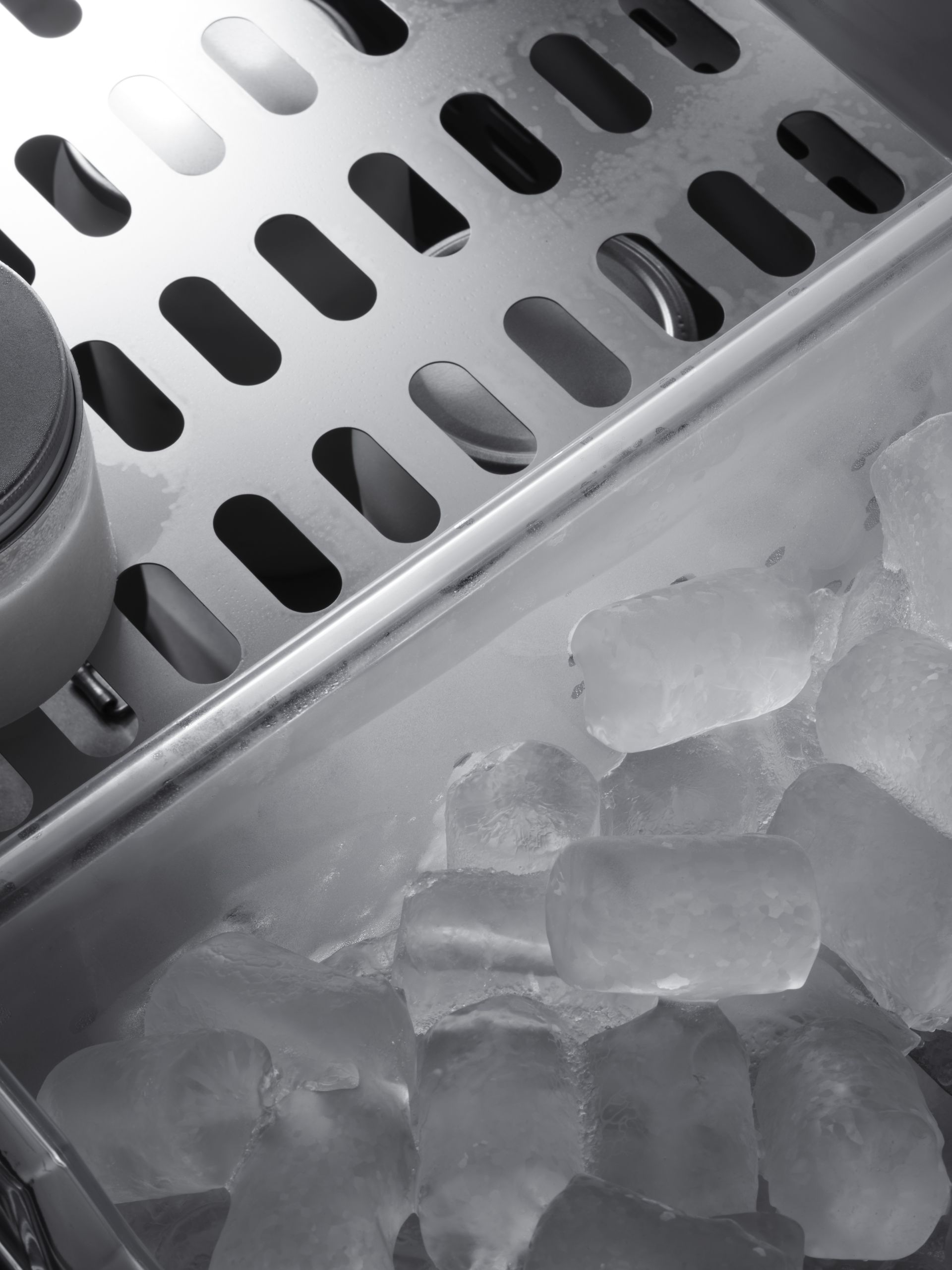 V-ZUG V6000 combicooler refridgerator in luxury kitchen showing close up of ice maker