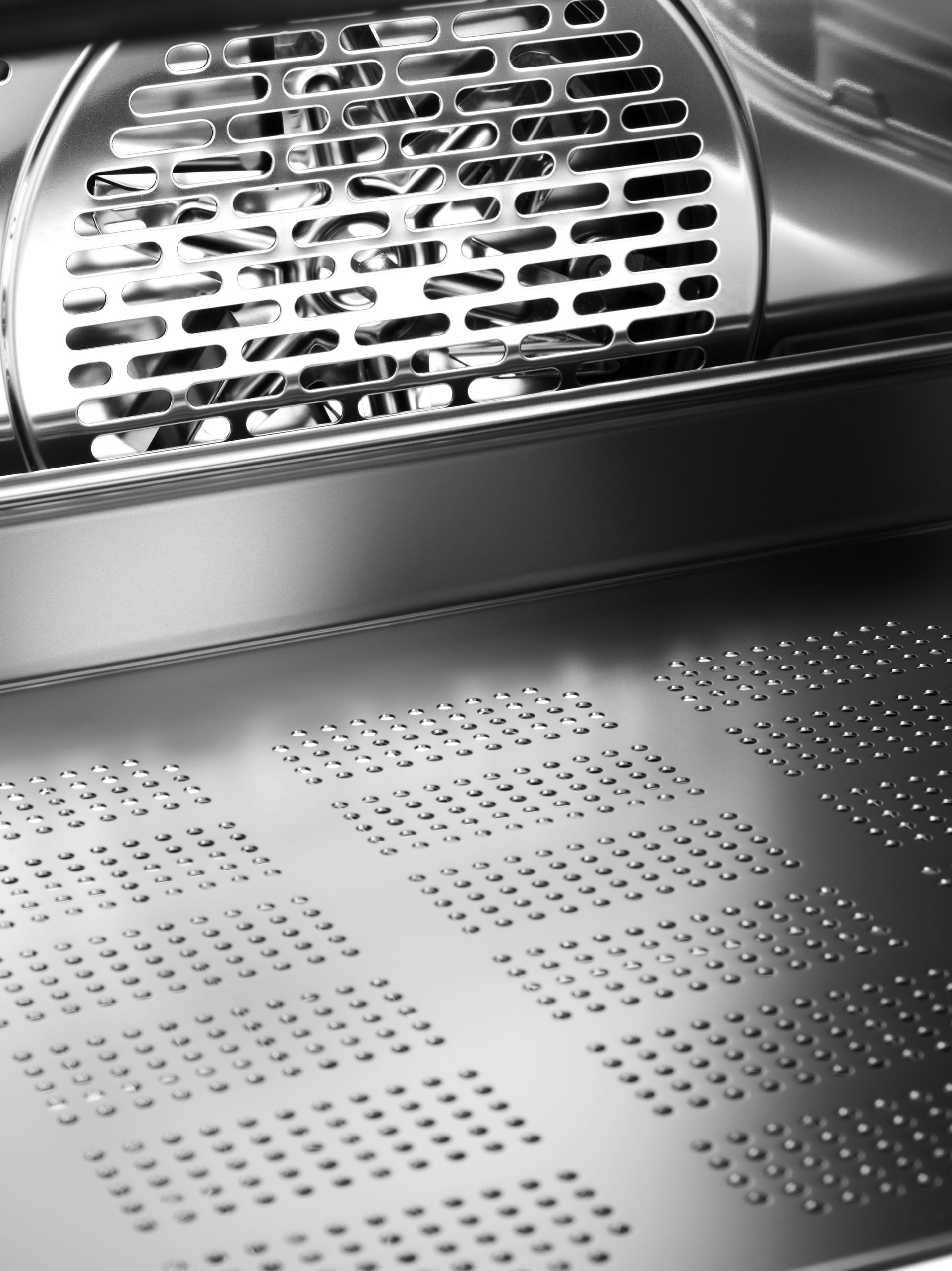 view inside V-ZUG cooker unit in luxury kitchen 