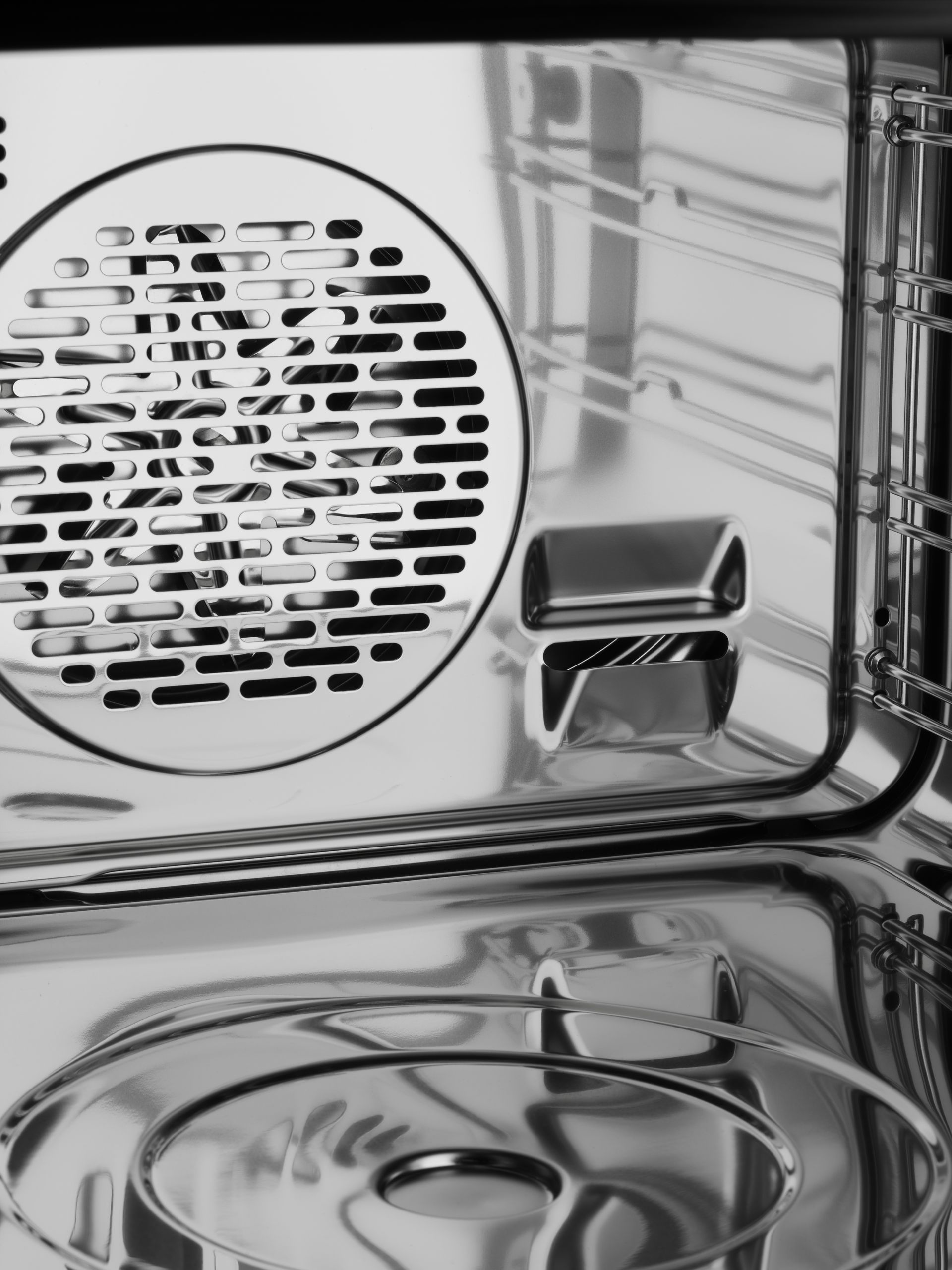 V-ZUG luxury kitchen with V6000 combisteamer cooker showing internal chrome