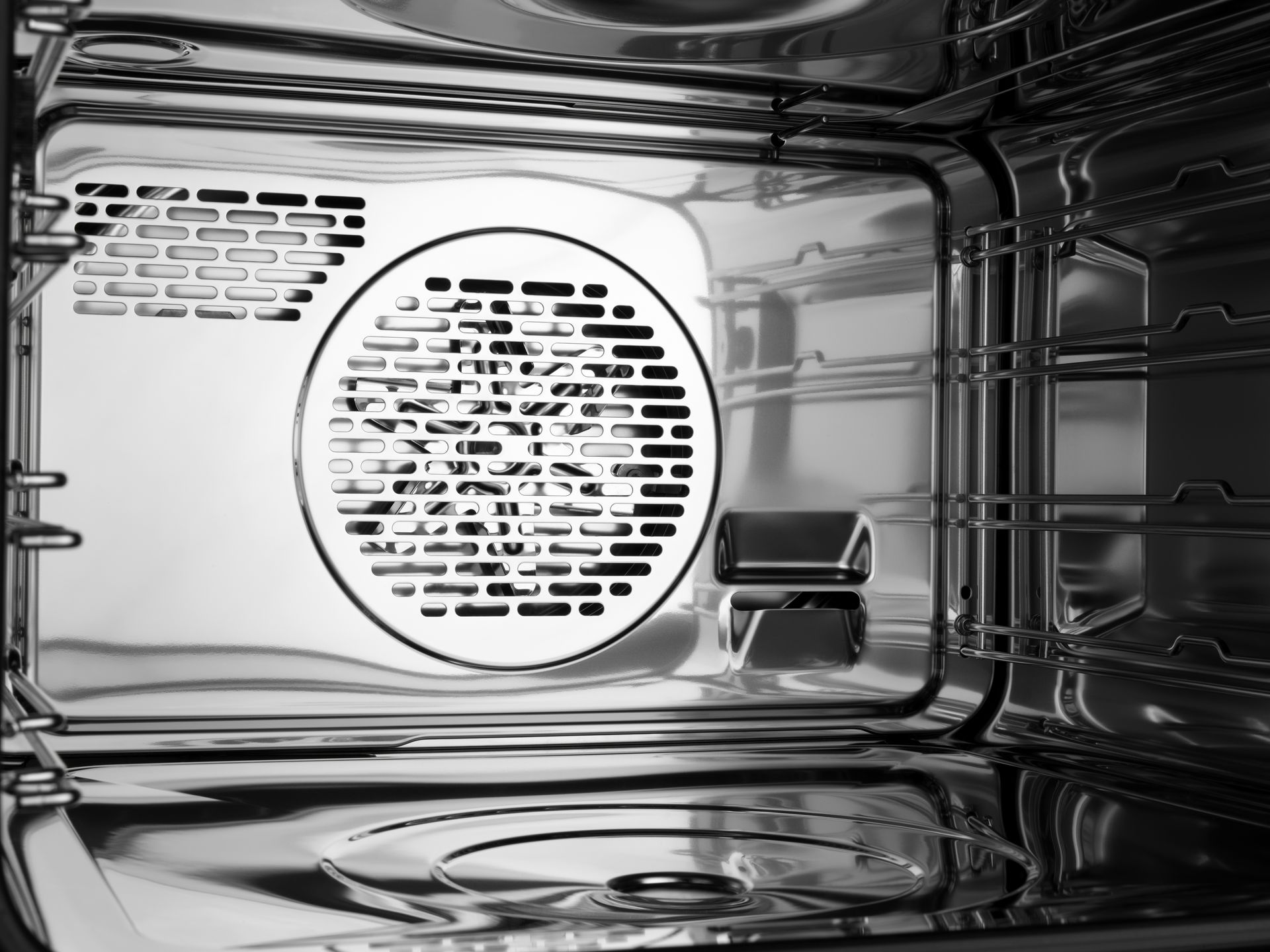 V-ZUG cooker image showing internal chrome componants in luxury kitchen