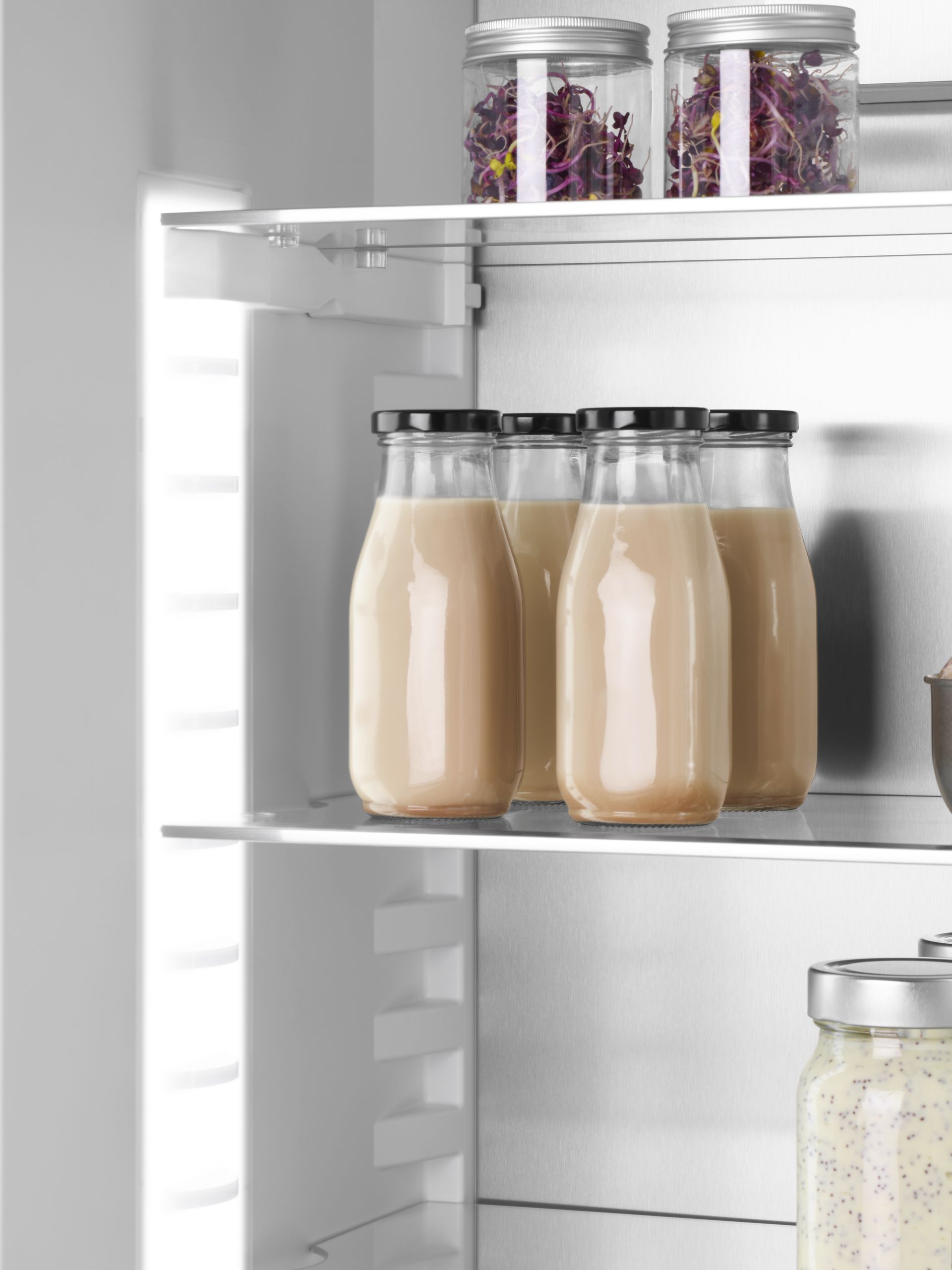 V-ZUG luxury kitchen with V4000 cooler refridgerator showing open door and food storage area