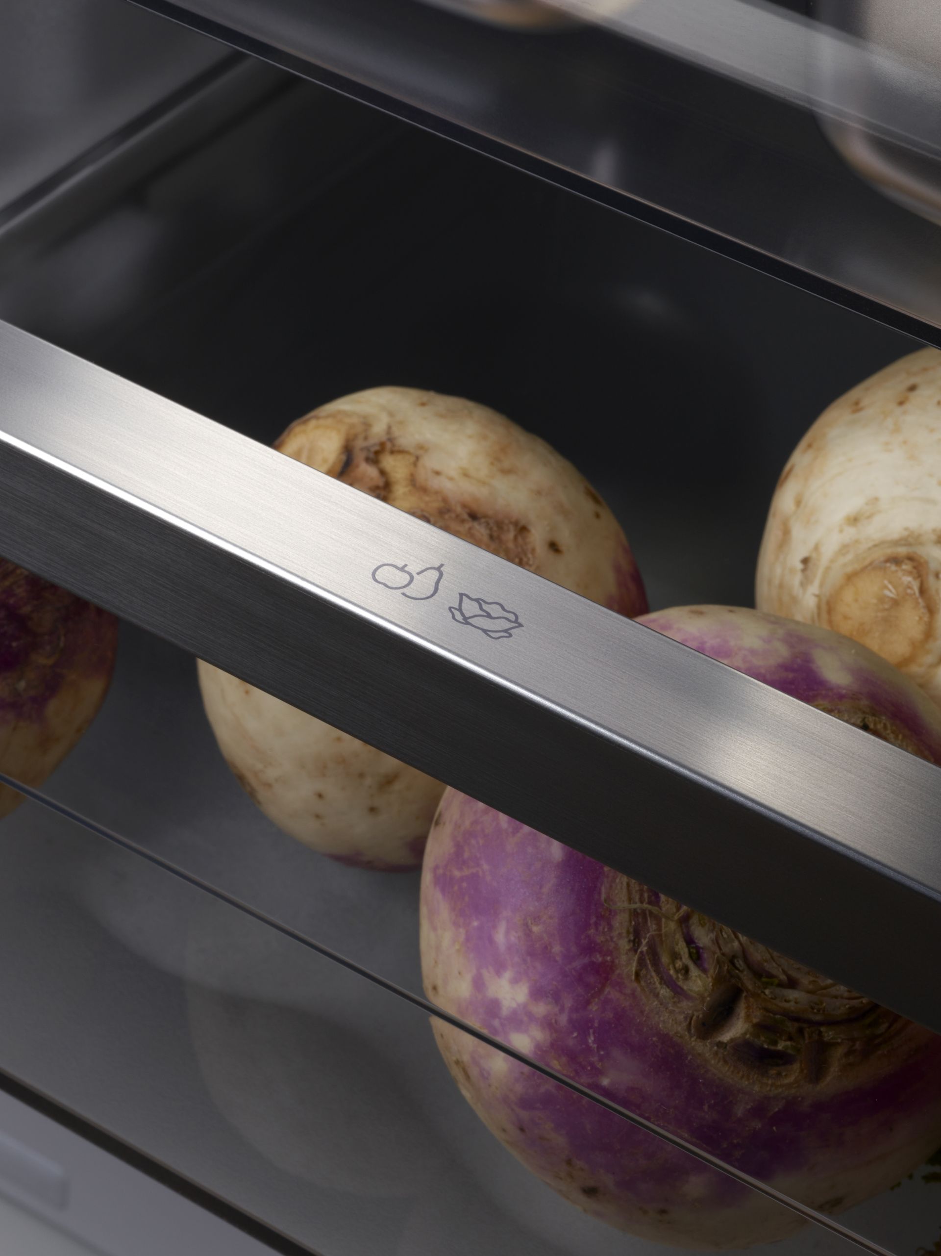 V-ZUG fridge internal drawer shot with vegetables in luxury kitchen