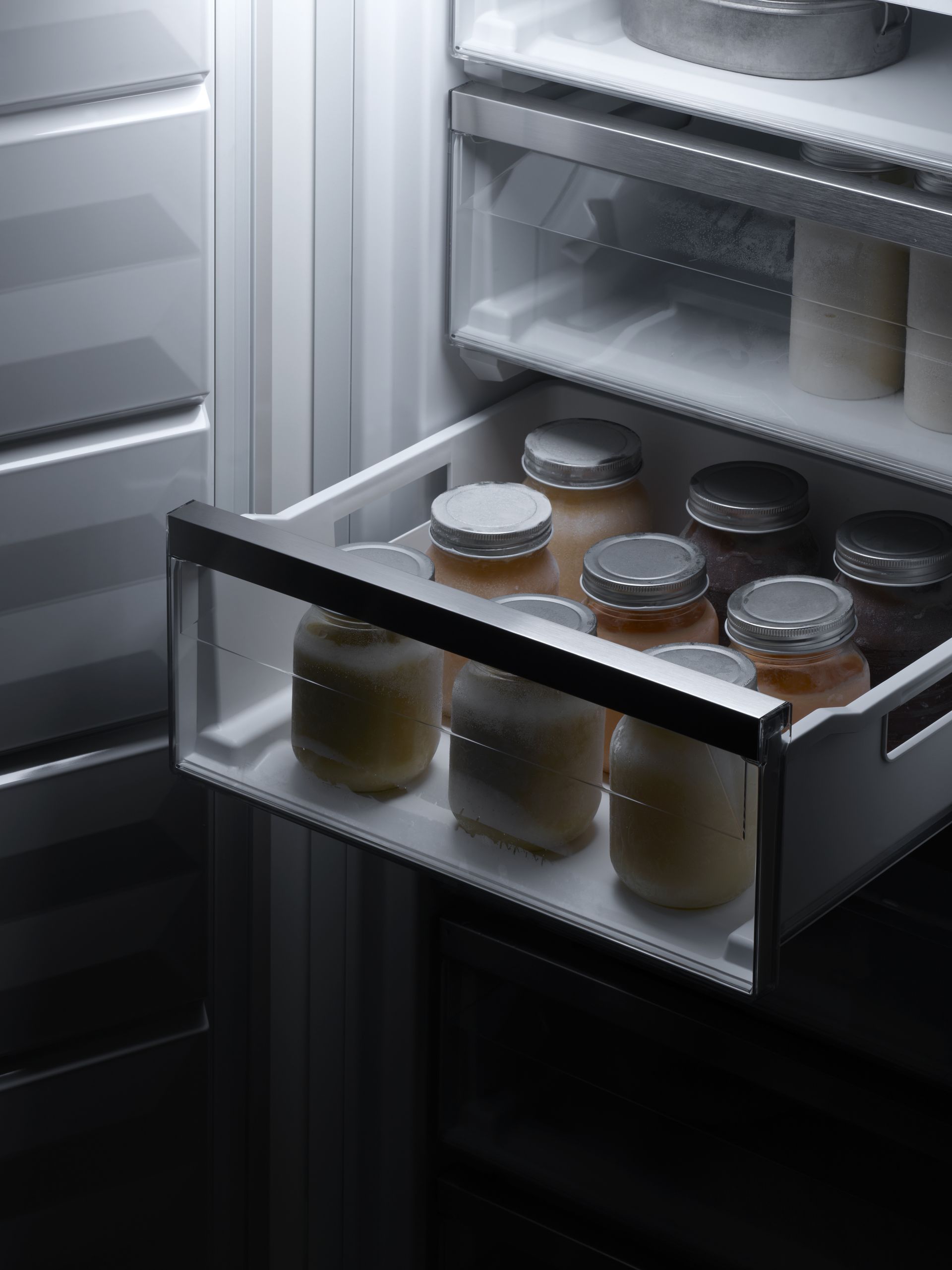 V-ZUG fridge internal drawer shot with jars in luxury kitchen