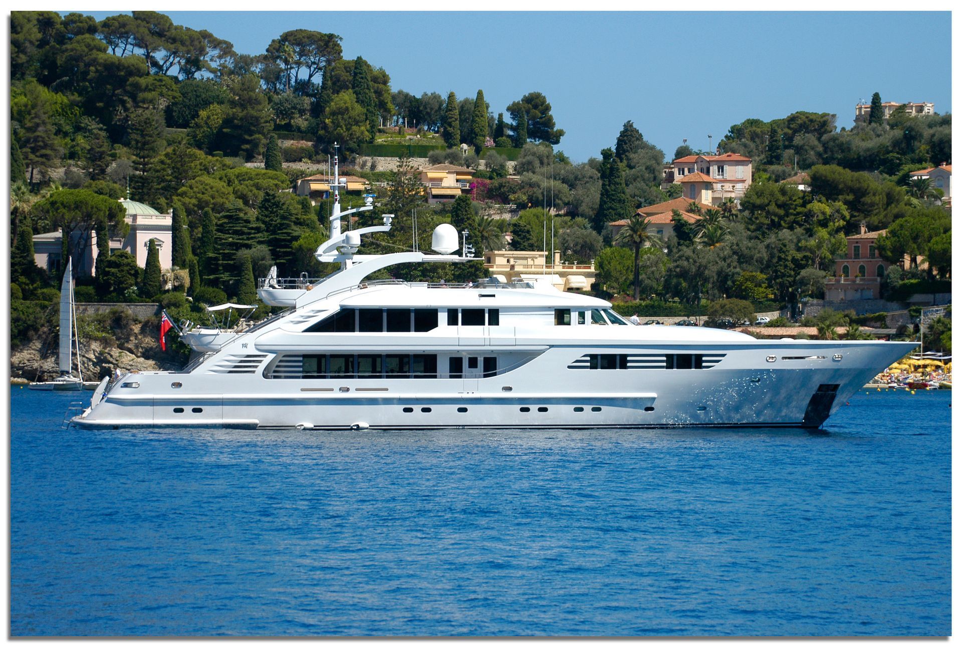 a large white superyacht is moored at Villefranche-sur-la-mare, France