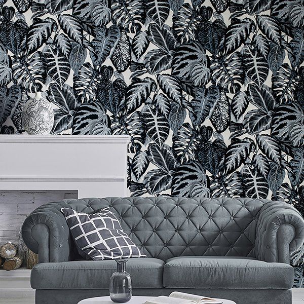 a living room with a couch and a fireplace .