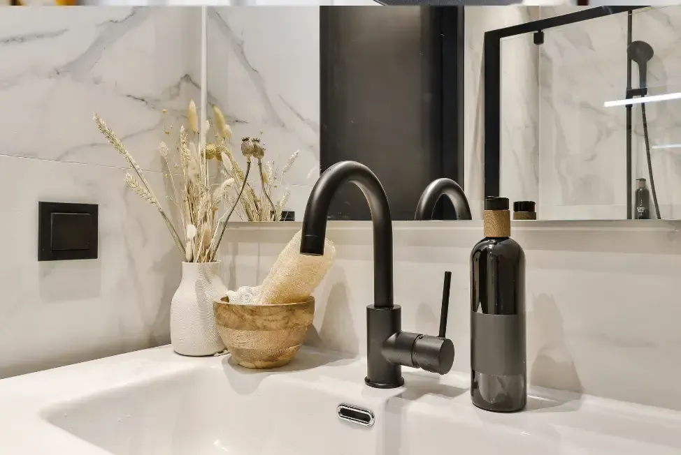 Modern black bathroom faucet installation by 17 Plumbing in Oakville home