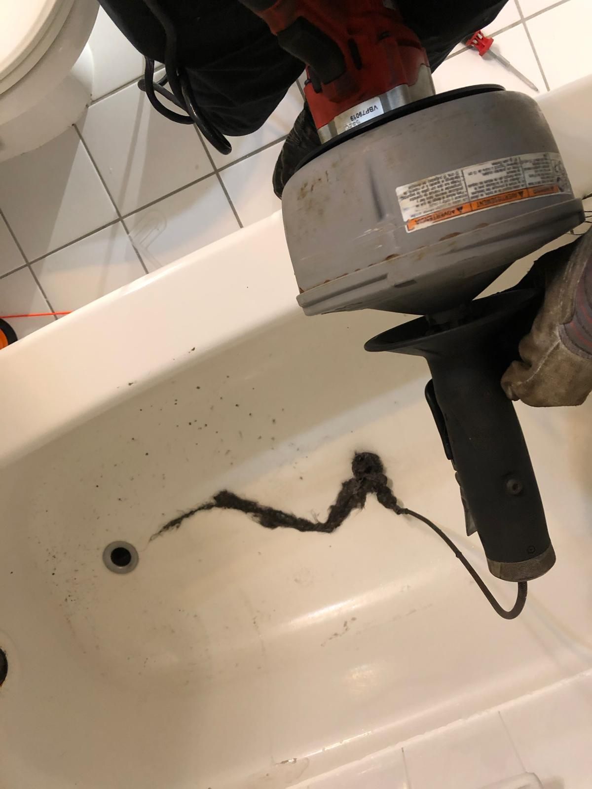 Snaking bathtub drain