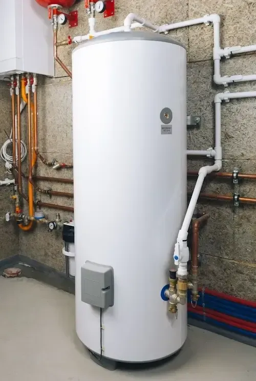 Residential hot water tank in Oakville home with copper plumbing, professionally installed by licens