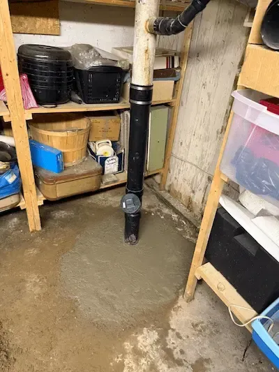 Basement drain repair completed after sewer backup with new pipe installed by emergency plumber oakville to restore proper drainage