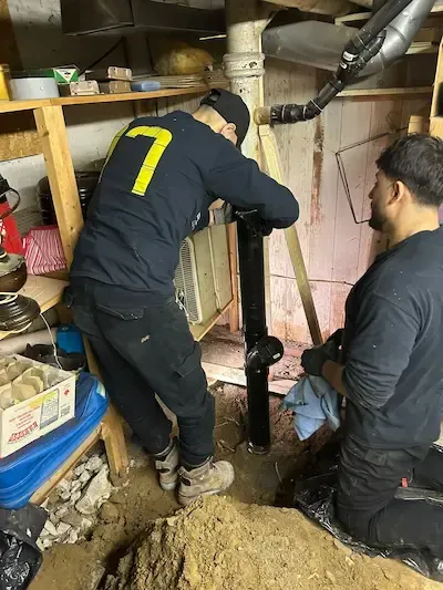 emergency plumber oakville repairing cracked sewer line basement excavation work