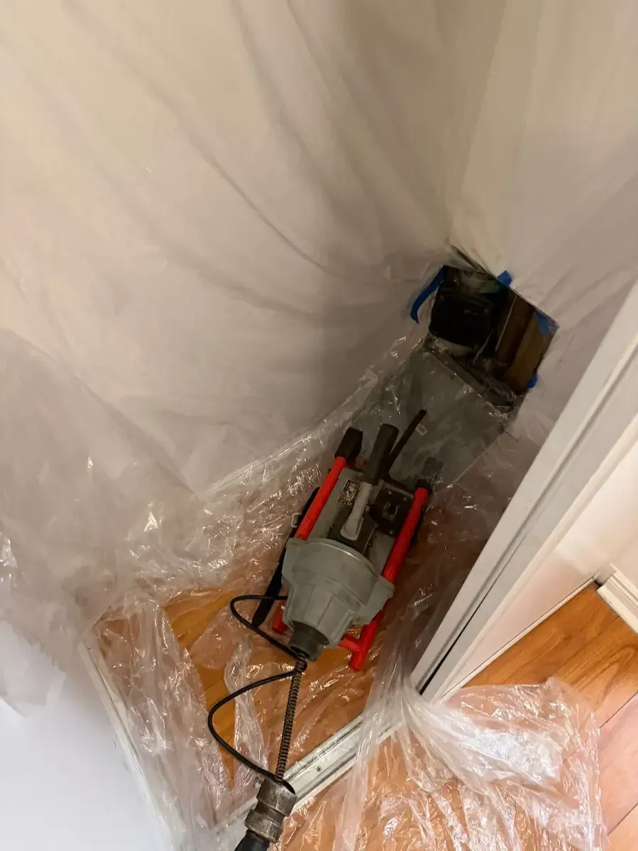 Emergency main drain backup clearing in Oakville condo – 17 Plumbing using commercial drain snake equipment