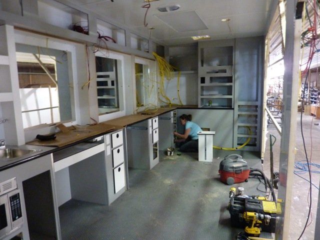 Custom Trailers — Man Polishing Metal Sheet in Anaheim, CA