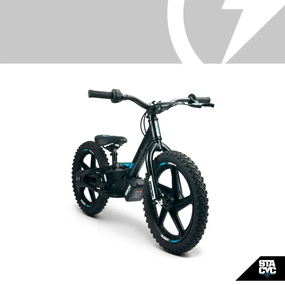 Black electric balance bike with knobby tires, blue accents, and a black frame.